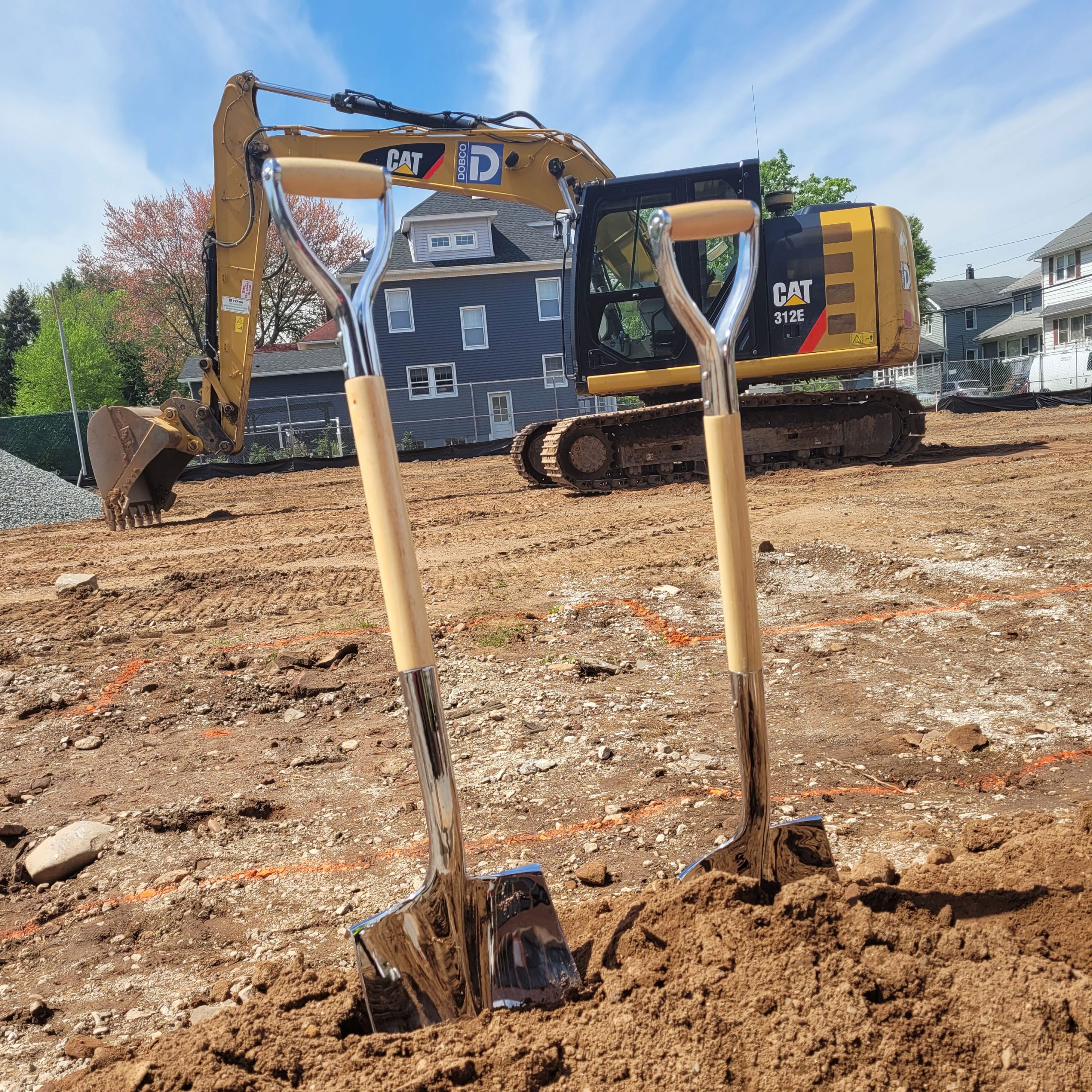 Groundbreaking at a new school shovels in dirt