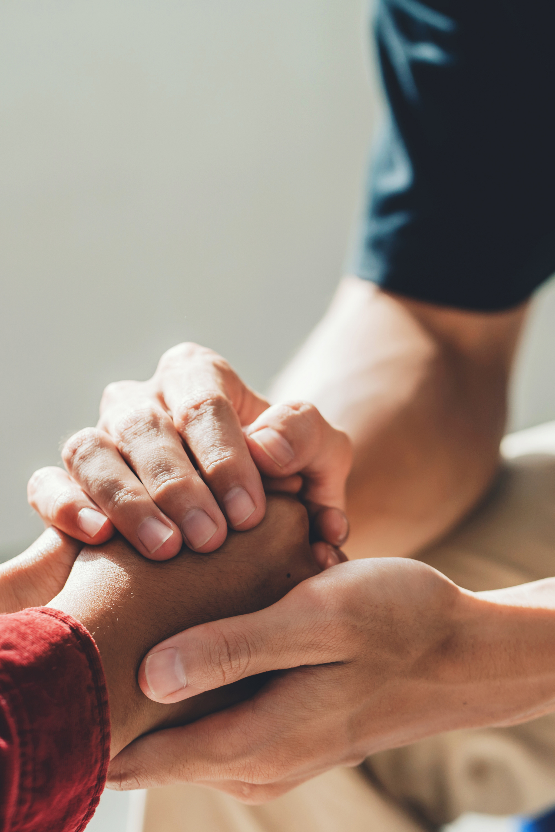 nonprofit hand holding support